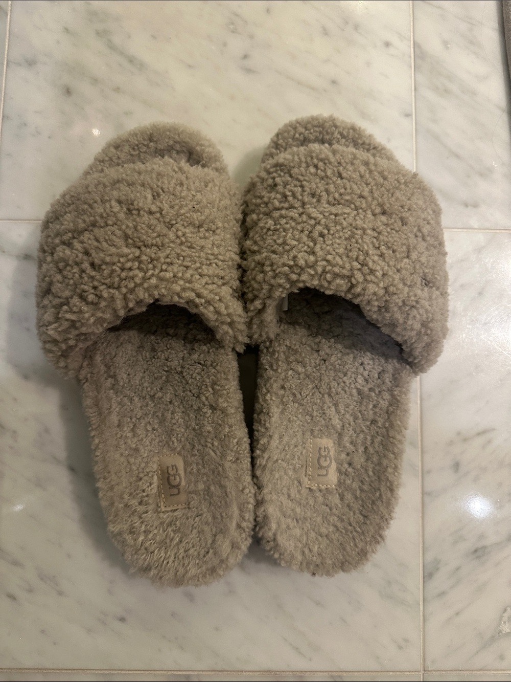 Ugg women’s Cozy Faux Shearling Slide Sandals in Taupe
